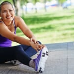 photo of woman stretching outdoors