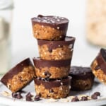 A stack of chocolate oatmeal cups on a plate.